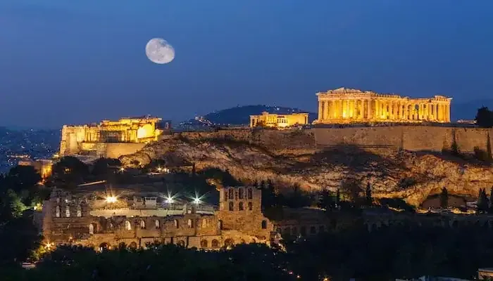 The Acropolis and Parthenon illuminated at night in Athens