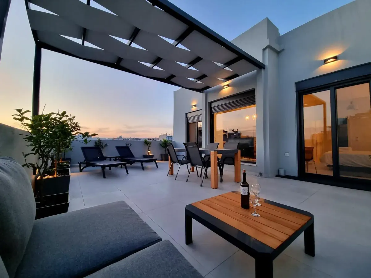 Luxury Penthouse Suite at 10 Apartments & Suites Athens showing the elegant living area